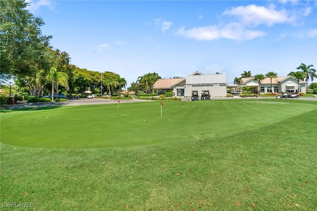 10334 Quail Crown Dr, Naples, FL 34119 - view of property's community with an area to practice putting and view of golf course
