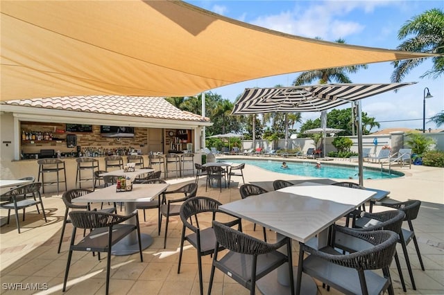10334 Quail Crown Dr, Naples, FL 34119 - view of patio / terrace featuring a community pool