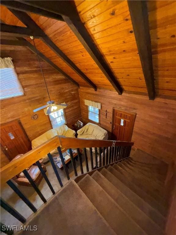304 Flagler St, Clewiston, FL 33440 - stairs featuring wood walls, wooden ceiling, and ceiling fan