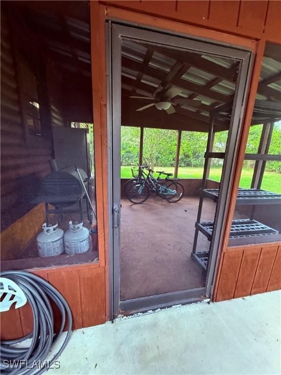 304 Flagler St, Clewiston, FL 33440 - gate featuring ceiling fan