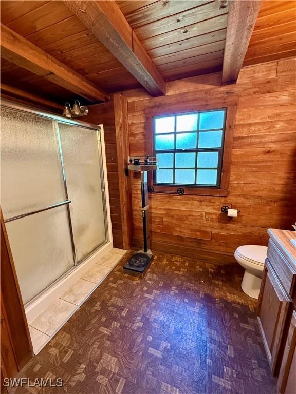 304 Flagler St, Clewiston, FL 33440 - bathroom featuring wooden walls, beamed ceiling, wood ceiling, a stall shower, and toilet