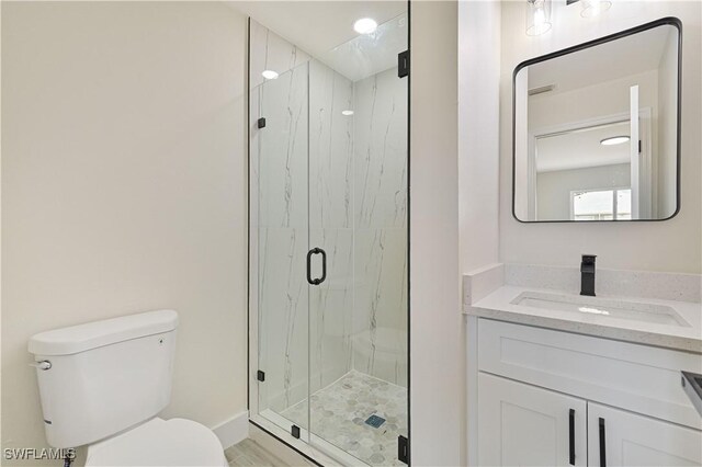 4733/4735 28th St SW, Lehigh Acres, FL 33973 - bathroom featuring toilet, a marble finish shower, and vanity