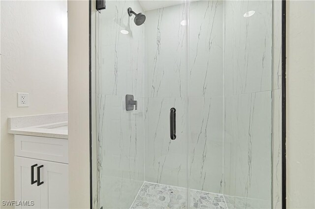 4733/4735 28th St SW, Lehigh Acres, FL 33973 - full bath with a marble finish shower and vanity