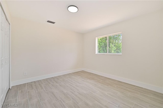 4733/4735 28th St SW, Lehigh Acres, FL 33973 - unfurnished room featuring light wood-type flooring and baseboards