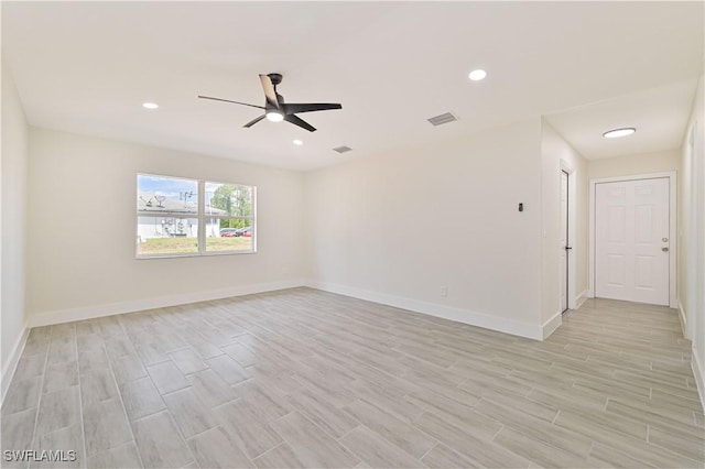 4733/4735 28th St SW, Lehigh Acres, FL 33973 - unfurnished room with ceiling fan, light wood finished floors, baseboards, and recessed lighting