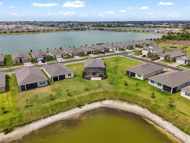 aerial perspective of suburban area featuring a nearby body of water