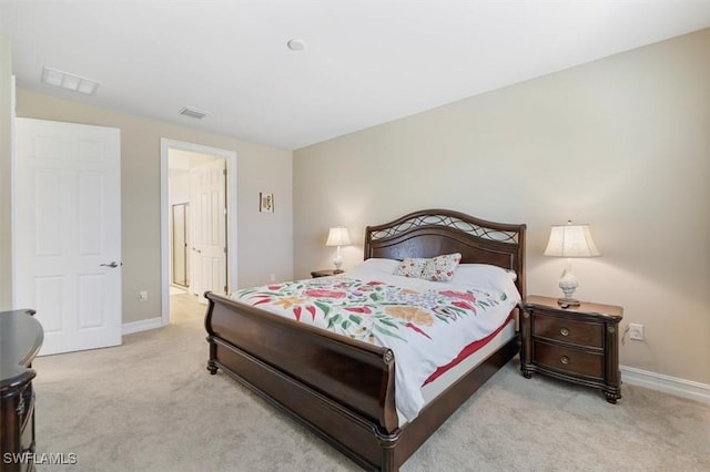 carpeted bedroom with baseboards