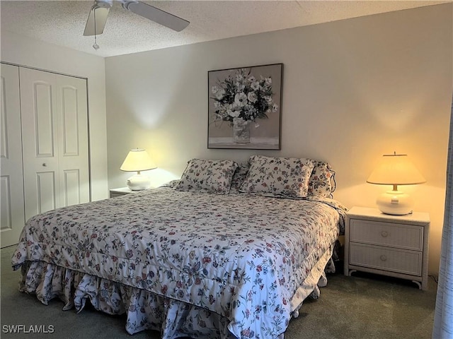 bedroom with dark colored carpet, a closet, a textured ceiling, and ceiling fan