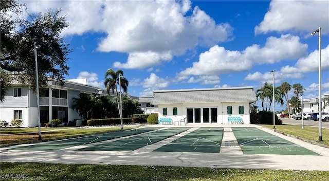 view of community with shuffleboard