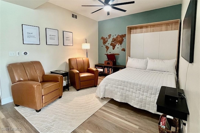 bedroom featuring light wood-style floors and ceiling fan