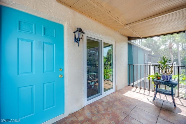 4200 Looking Glass Ln Unit 4206, Naples, FL 34112 - view of exterior entry with stucco siding