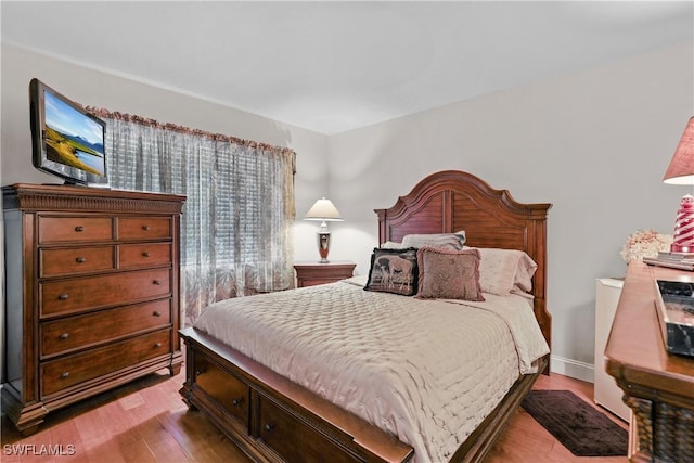 4200 Looking Glass Ln Unit 4206, Naples, FL 34112 - bedroom featuring wood finished floors