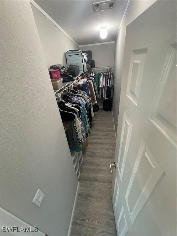 5570 Cypresswoods Resort Dr, Fort Myers, FL 33905 - spacious closet featuring wood finished floors