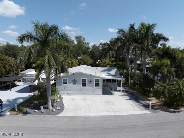 5570 Cypresswoods Resort Dr, Fort Myers, FL 33905 - view of front of house with concrete driveway
