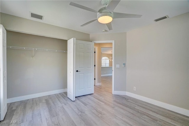 unfurnished bedroom with light wood-style floors, baseboards, a closet, and ceiling fan