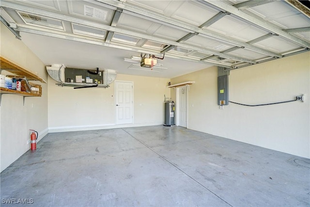 garage featuring water heater, electric panel, and a garage door opener