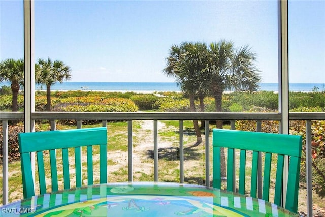 balcony featuring a water view