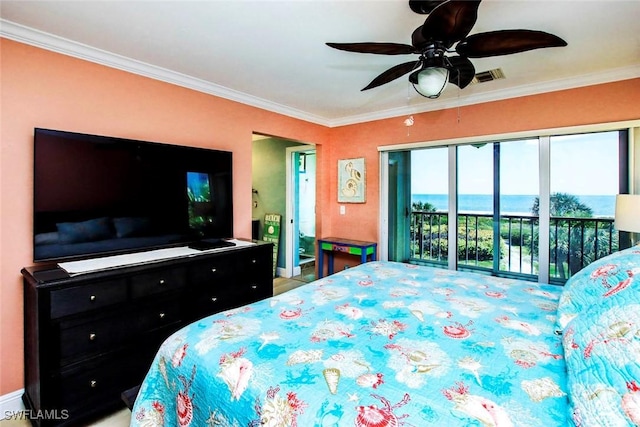 bedroom with crown molding, access to exterior, ceiling fan, and a water view