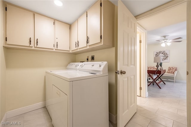 laundry area with washer and dryer, baseboards, cabinet space, a ceiling fan, and light tile patterned floors