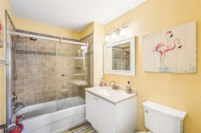 1520 SW 50th St Unit 202, Cape Coral, FL 33914 - full bathroom featuring shower / bath combination with glass door, toilet, and vanity