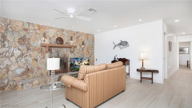 767 Glendale Ave, Naples, FL 34110 - living area featuring light wood finished floors, ceiling fan, a fireplace, and recessed lighting