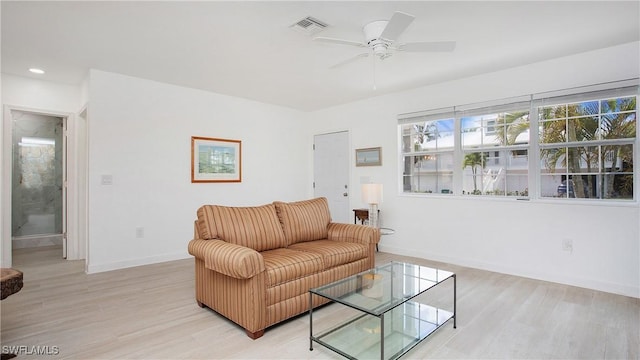 767 Glendale Ave, Naples, FL 34110 - living room with light wood finished floors, a ceiling fan, and recessed lighting