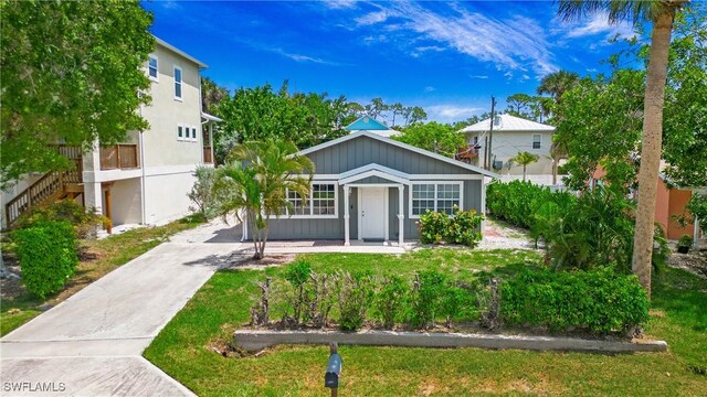 767 Glendale Ave, Naples, FL 34110 - view of front facade featuring driveway