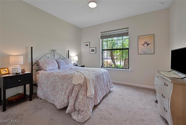 20956 Corkscrew Shores Blvd E, Estero, FL 33928 - bedroom with light colored carpet and baseboards