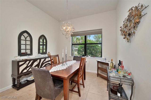 20956 Corkscrew Shores Blvd E, Estero, FL 33928 - dining area featuring a chandelier, light tile patterned floors, and baseboards