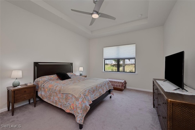 20956 Corkscrew Shores Blvd E, Estero, FL 33928 - carpeted bedroom featuring baseboards, a tray ceiling, and a ceiling fan