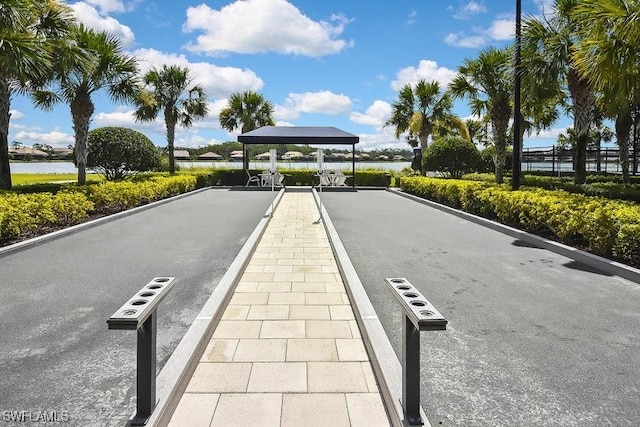 20956 Corkscrew Shores Blvd E, Estero, FL 33928 - view of home's community with a bocce ball area and a water view