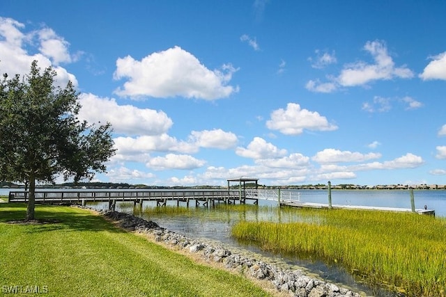20956 Corkscrew Shores Blvd E, Estero, FL 33928 - dock area with a water view and a lawn