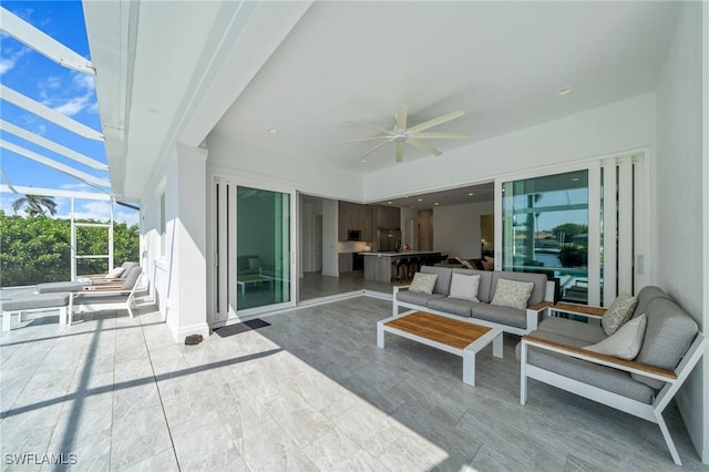 14931 David Dr, Fort Myers, FL 33908 - view of patio with a ceiling fan, an outdoor hangout area, and a lanai