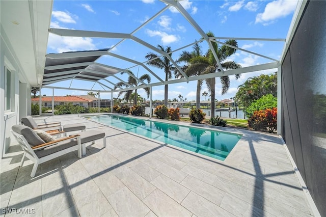 14931 David Dr, Fort Myers, FL 33908 - outdoor pool featuring a patio area, a lanai, and a water view