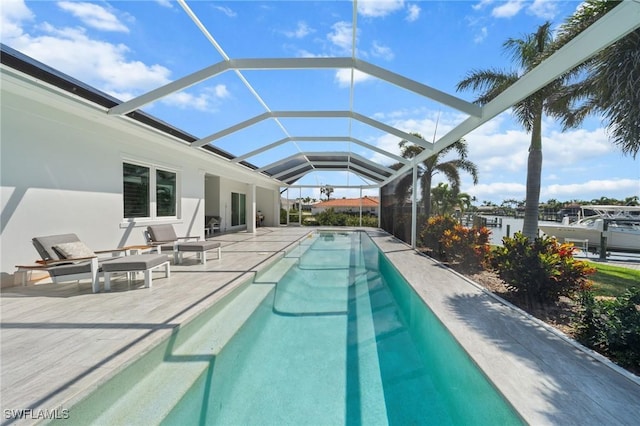 14931 David Dr, Fort Myers, FL 33908 - swimming pool with a patio and glass enclosure