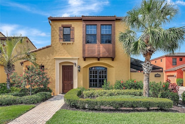 view of front of property featuring stucco siding
