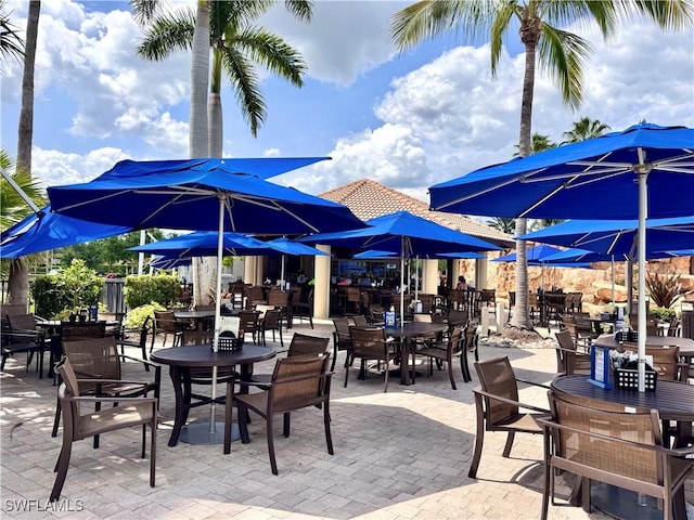 view of patio featuring outdoor dining area