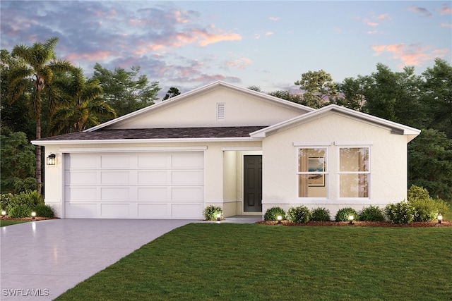 view of front of property with concrete driveway, a front yard, an attached garage, and stucco siding