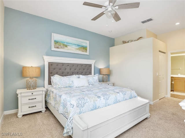 8532 Via Lungomare Cir Unit 203, Estero, FL 33928 - bedroom with light carpet, baseboards, ensuite bathroom, ceiling fan, and recessed lighting