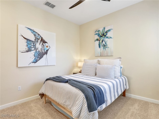 8532 Via Lungomare Cir Unit 203, Estero, FL 33928 - bedroom with carpet flooring, baseboards, and a ceiling fan