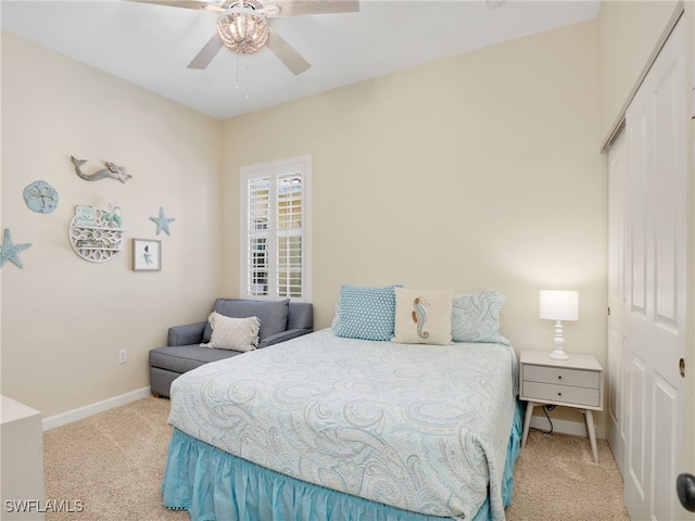 8532 Via Lungomare Cir Unit 203, Estero, FL 33928 - bedroom featuring carpet, a closet, baseboards, and ceiling fan