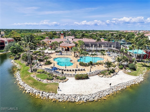 8532 Via Lungomare Cir Unit 203, Estero, FL 33928 - drone / aerial view of a pool area and a large body of water