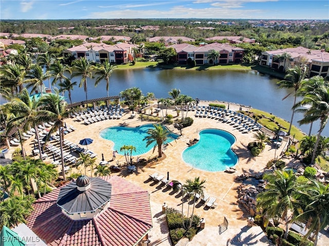 8532 Via Lungomare Cir Unit 203, Estero, FL 33928 - community pool featuring a water view and a residential view
