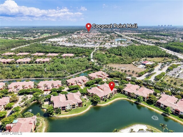 8532 Via Lungomare Cir Unit 203, Estero, FL 33928 - aerial view of property and surrounding area with nearby suburban area and a large body of water