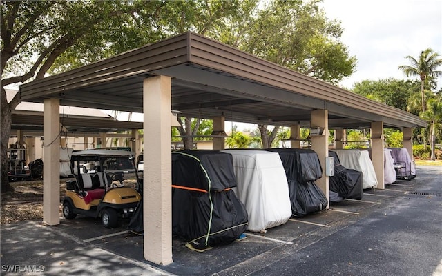 5825 Trailwinds Dr Unit 425, Fort Myers, FL 33907 - view of covered parking lot