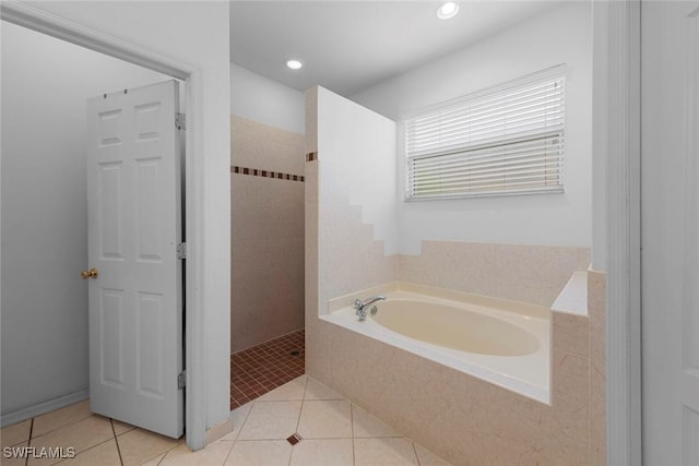 full bathroom with tile patterned floors, walk in shower, a bath, and recessed lighting
