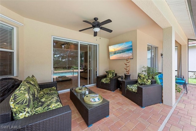 view of patio featuring a ceiling fan and an outdoor hangout area