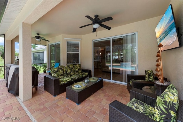 view of patio / terrace featuring a ceiling fan, an outdoor hangout area, and a grill
