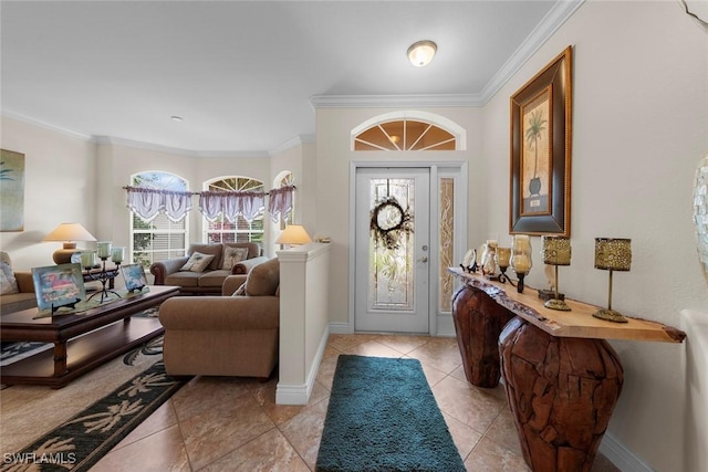 entrance foyer featuring crown molding, baseboards, and light tile patterned floors