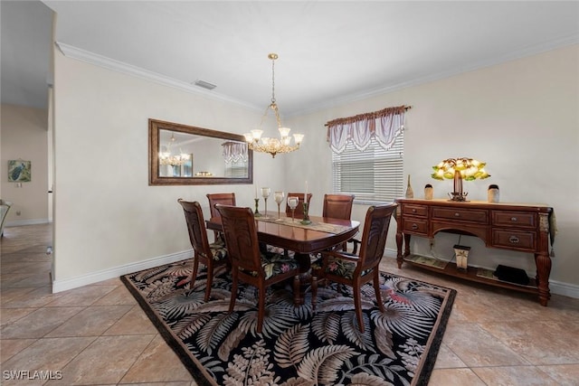 dining space featuring crown molding, a chandelier, and baseboards